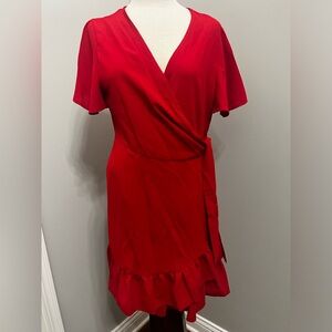 Red wrap around short sleeve above knee ruffled dress